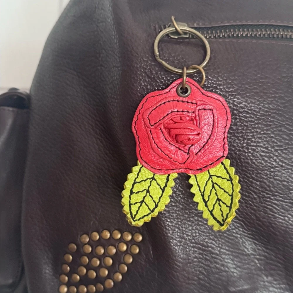 Betsey Johnson vintage hobo Leather Handbag with Rose Charms